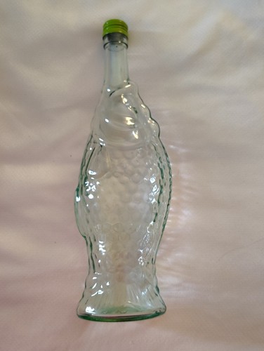 Empty light green glass fish - empty,